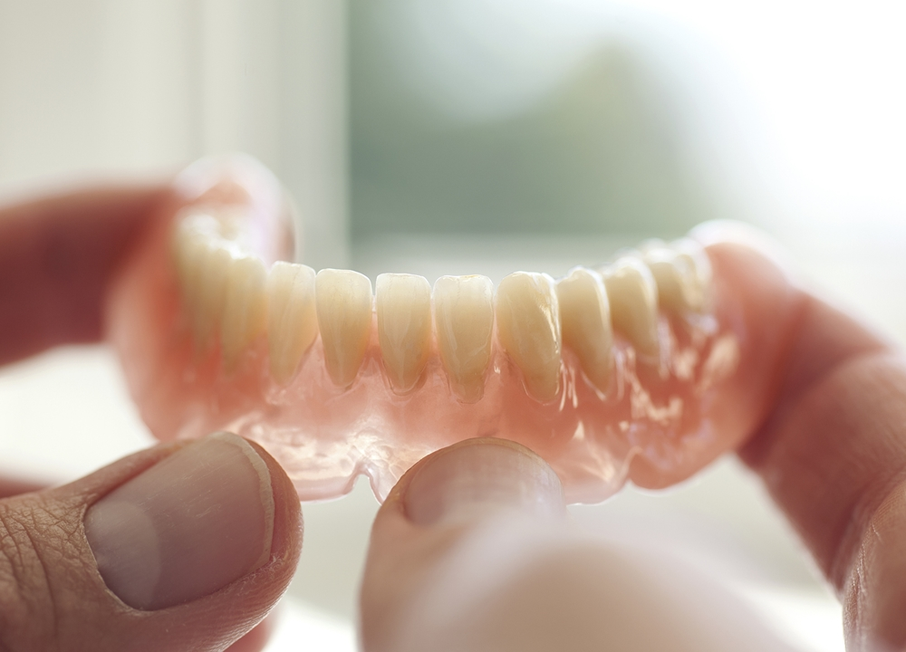 Dental implants versus removable dentures comparison
