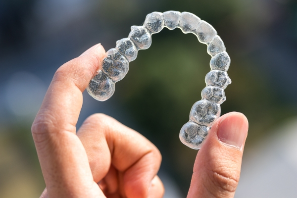 Damon braces vs conventional braces comparison for comfort, hygiene, cost, and treatment results